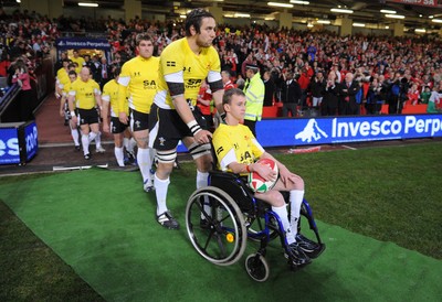 14.11.08 - Wales v Canada -  Invesco Perpetual Series 2008 - Ryan Jones leads out his Welsh team with mascot Alex Evans. 