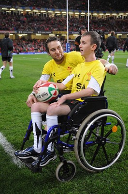 14.11.08 - Wales v Canada -  Invesco Perpetual Series 2008 - Ryan Jones leads out his Welsh team with mascot Alex Evans. 