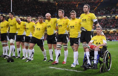 14.11.08 - Wales v Canada -  Invesco Perpetual Series 2008 - Ryan Jones stands for the national anthems with mascot Alex Evans. 