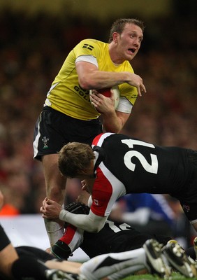 14.11.08 ... Wales v Canada, Invesco Perpetual International 2008 Wales' Morgan Stoddart is tackled by Canada's Matt Evans  