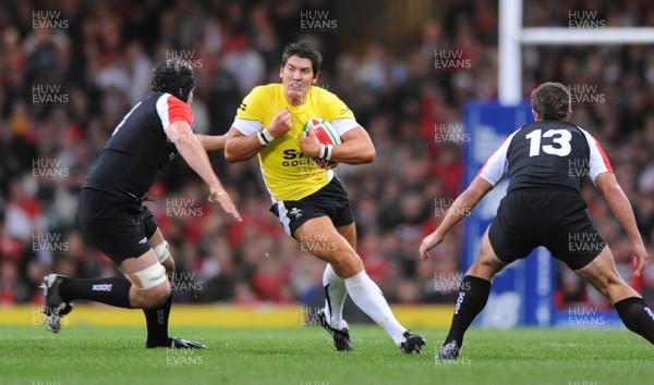 14.11.08 - Wales v Canada -  Invesco Perpetual Series 2008 - Wales' James Hook takes on Canada's Tyler Hotson.  