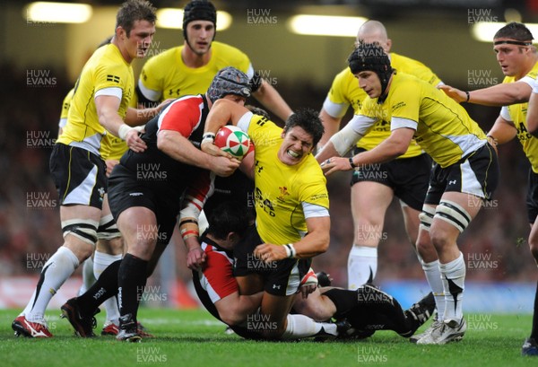 14.11.08 - Wales v Canada -  Invesco Perpetual Series 2008 - Wales' James Hook grimaces as he goes down with an injury.  