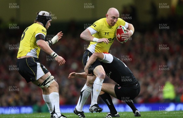 14.11.08 ... Wales v Canada, Invesco Perpetual International 2008 Wales' Tom Shanklin is tackled by Canada's Ciaran Hearn  