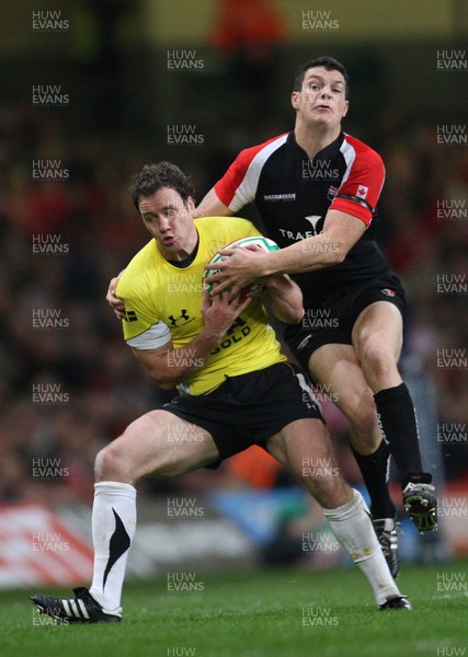 14.11.08 ... Wales v Canada, Invesco Perpetual International 2008 Wales' Mark Jones  is challenged by Canada's Ciaran Hearn 