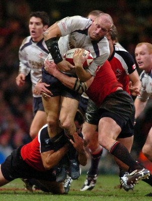 17.11.06 - Wales v Canada - Invesco Perpetual Series 2006 - Wales' Gareth Thomas is tackled by Derek Daypuck(L) 