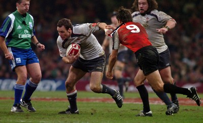 17.11.06 - Wales v Canada - Invesco Perpetual Series 2006 - Wales' Mark Jones tries to get past Morgan Williams 