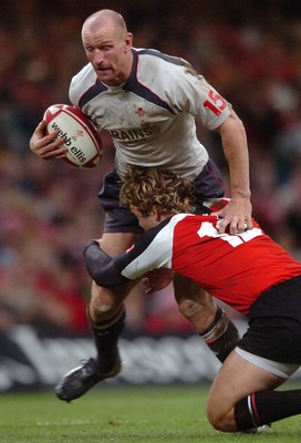 17.11.06  Wales v Canada Gareth Thomas is tacklrd by David Spicer  