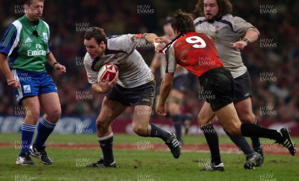 17.11.06 - Wales v Canada - Invesco Perpetual Series 2006 - Wales' Mark Jones tries to get past Morgan Williams 