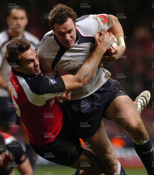 17.11.06 - Wales v Canada - Invesco Perpetual Series 2006 - Wales' Mark Jones is tackled by Ed Fairhurst 