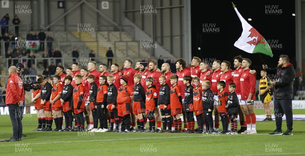 191022 - Wales v Cook Islands - Rugby League World Cup 2021 - Wales and mascots