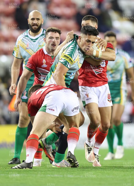 191022 - Wales v Cook Islands - Rugby League World Cup 2021 - Connor Davies of Wales Rugby League and Curtis Davies of Wales Rugby League  tackle Kayal Iro of Cook Islands