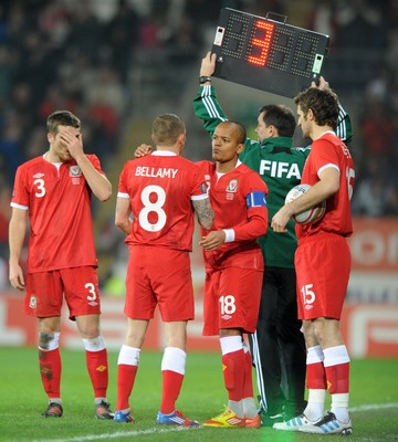 290212 - Wales v Costa Rica -Craig Bellamy of Wales leaves the field after being substituted