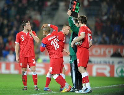 290212 - Wales v Costa Rica -Craig Bellamy of Wales leaves the field after being substituted