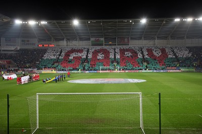 290212 - Wales v Costa Rica, The Gary Speed Memorial Match, Cardiff - Fans spell out Gary's name during the singing of the National Anthem at the start of the match 