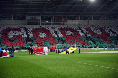 290212 - Wales v Costa Rica, The Gary Speed Memorial Match, Cardiff - Fans spell out Gary's name during the singing of the National Anthem at the start of the match 