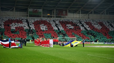 290212 - Wales v Costa Rica, The Gary Speed Memorial Match, Cardiff - Fans spell out Gary's name during the singing of the National Anthem at the start of the match 