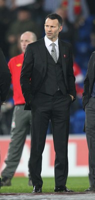 290212 - Wales v Costa Rica, The Gary Speed Memorial Match, Cardiff - Ryan Giggs is amongst the former Welsh players to honour Gary Speed at half time 