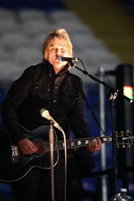 290212 - Wales v Costa Rica, The Gary Speed Memorial Match, Cardiff - Mike Peters performs before the start of the match 