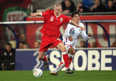 290212 - Wales v Costa Rica, The Gary Speed Memorial Match, Cardiff - Wales' Steve Morrison gets away from Costa Rica's Jose Salvatierra 