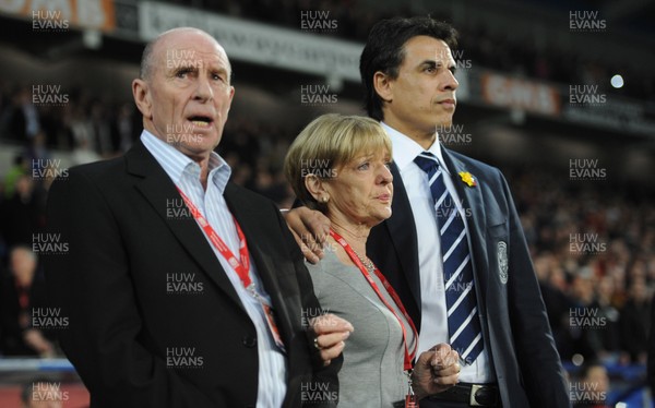 290212 - Wales v Costa Rica -Wales manager Chris Coleman looks on during the national anthems with Gary Speed's parents Roger and Carol