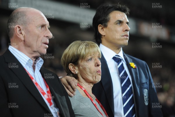 290212 - Wales v Costa Rica -Wales manager Chris Coleman looks on during the national anthems with Gary Speed's parents Roger and Carol