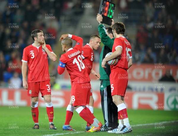 290212 - Wales v Costa Rica -Craig Bellamy of Wales leaves the field after being substituted