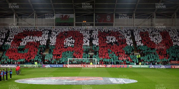290212 - Wales v Costa Rica, The Gary Speed Memorial Match, Cardiff - Fans spell out Gary's name during the singing of the National Anthem at the start of the match 