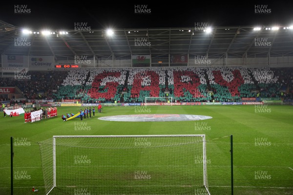 290212 - Wales v Costa Rica, The Gary Speed Memorial Match, Cardiff - Fans spell out Gary's name during the singing of the National Anthem at the start of the match 