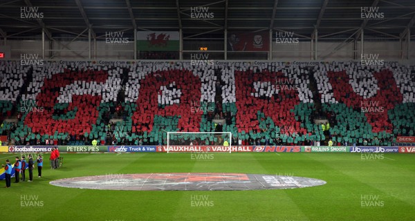 290212 - Wales v Costa Rica, The Gary Speed Memorial Match, Cardiff - Fans spell out Gary's name during the singing of the National Anthem at the start of the match 