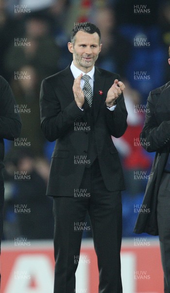 290212 - Wales v Costa Rica, The Gary Speed Memorial Match, Cardiff - Ryan Giggs is amongst the former Welsh players to honour Gary Speed at half time 