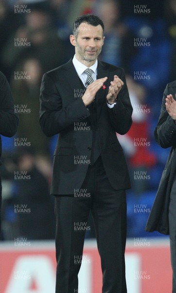 290212 - Wales v Costa Rica, The Gary Speed Memorial Match, Cardiff - Ryan Giggs is amongst the former Welsh players to honour Gary Speed at half time 