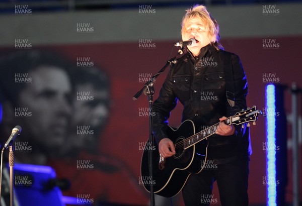 290212 - Wales v Costa Rica, The Gary Speed Memorial Match, Cardiff - Mike Peters performs before the start of the match 