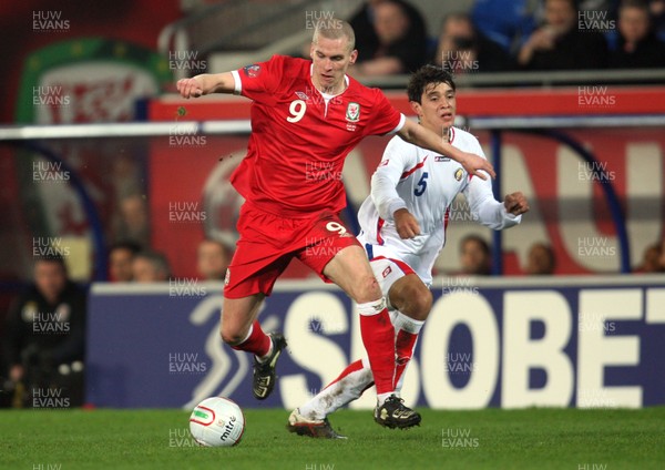 290212 - Wales v Costa Rica, The Gary Speed Memorial Match, Cardiff - Wales' Steve Morrison gets away from Costa Rica's Jose Salvatierra 