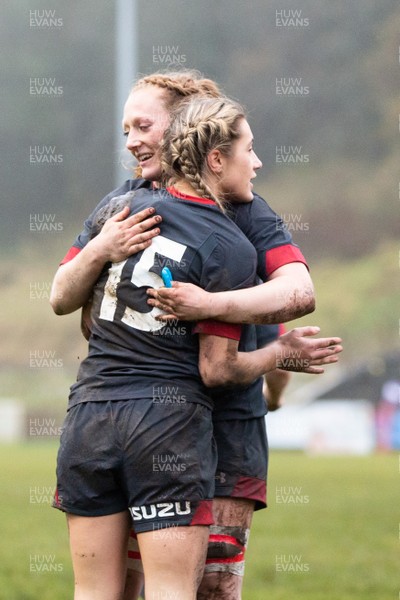 231119 - Wales Women v Crawshay's Women - Paige Randall of Wales (15) celebrates with Abbie Fleming after scoring a try
