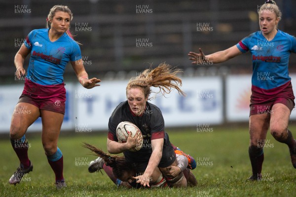231119 - Wales Women v Crawshay's Women - Abbie Fleming of Wales is tackled