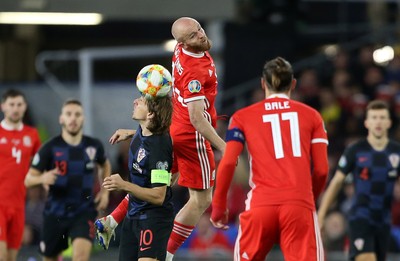 131019 - Wales v Croatia - European Championship Qualifiers - Group E - Jonny Williams of Wales is challenged by Luka Modric of Croatia