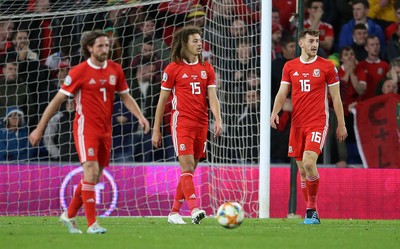 131019 - Wales v Croatia - European Championship Qualifiers - Group E - Dejected Joe Allen, Ethan Ampadu and Tom Lockyer of Wales