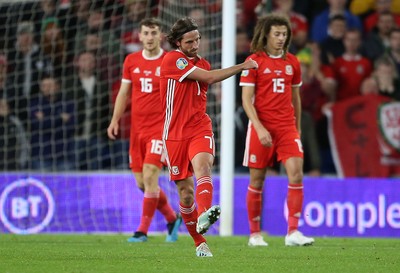 131019 - Wales v Croatia - European Championship Qualifiers - Group E - Dejected Joe Allen, Ethan Ampadu and Tom Lockyer of Wales