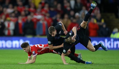 131019 - Wales v Croatia - European Championship Qualifiers - Group E - Daniel James of Wales falls to the ground after colliding with Domagoj Vida of Croatia