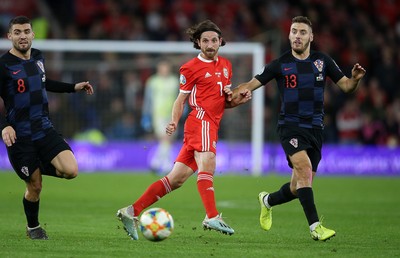 131019 - Wales v Croatia - European Championship Qualifiers - Group E - Joe Allen of Wales is challenged by Nikola Vlasic of Croatia