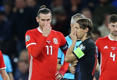 131019 - Wales v Croatia - European Championship Qualifiers - Group E - Gareth Bale of Wales and Luka Modric of Croatia