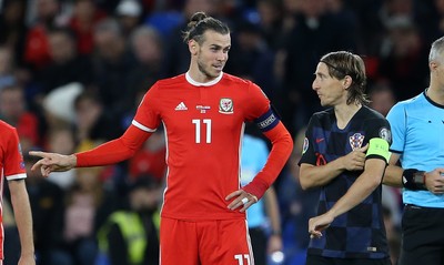 131019 - Wales v Croatia - European Championship Qualifiers - Group E - Gareth Bale of Wales and Luka Modric of Croatia