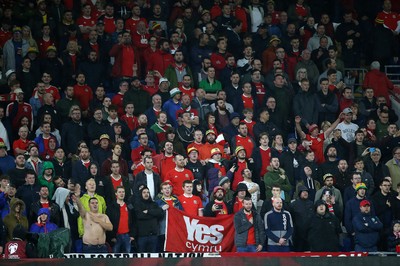 131019 - Wales v Croatia - European Championship Qualifiers - Group E - Wales fans during the anthem holding a Yes Cymru flag