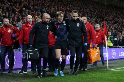 131019 - Wales v Croatia - European Championship Qualifiers - Group E - Luka Modric of Croatia goes off injured