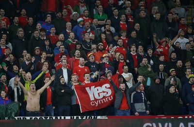 131019 - Wales v Croatia - European Championship Qualifiers - Group E - Wales fans during the anthem holding a Yes Cymru flag