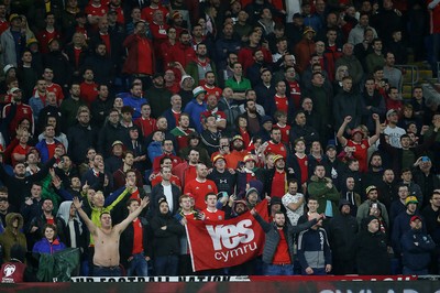 131019 - Wales v Croatia - European Championship Qualifiers - Group E - Wales fans during the anthem holding a Yes Cymru flag