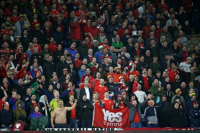 131019 - Wales v Croatia - European Championship Qualifiers - Group E - Wales fans during the anthem holding a Yes Cymru flag