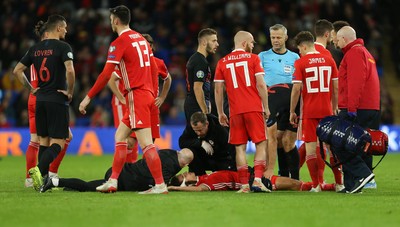 131019 - Wales v Croatia, UEFA Euro 2020 Qualifier - Ethan Ampadu of Wales receives treatment after a heavy challenge