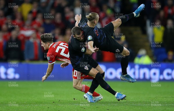 131019 - Wales v Croatia - European Championship Qualifiers - Group E - Daniel James of Wales falls to the ground after colliding with Domagoj Vida of Croatia