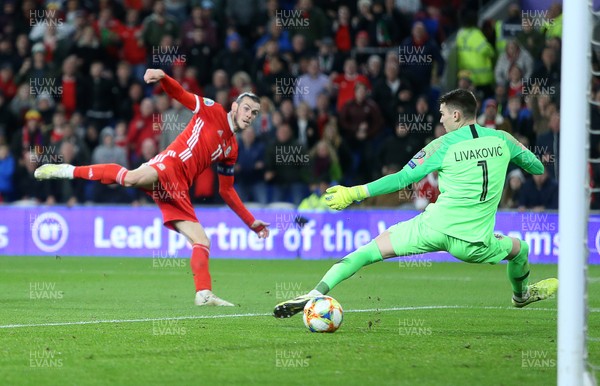 131019 - Wales v Croatia - European Championship Qualifiers - Group E - Gareth Bale of Wales gets the ball past Croatia goalkeeper Dominik Livakovic to score a goal